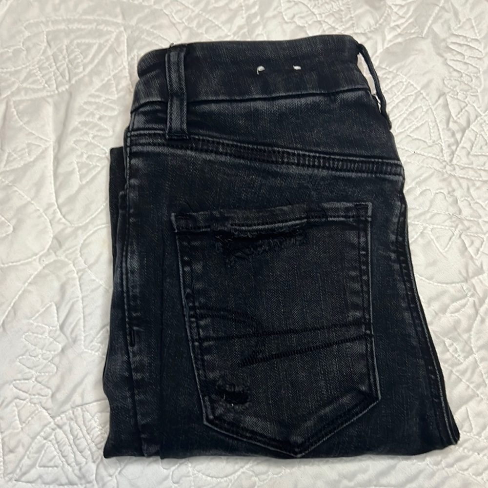 American Eagle black ripped jeans! “Ae forever soft”